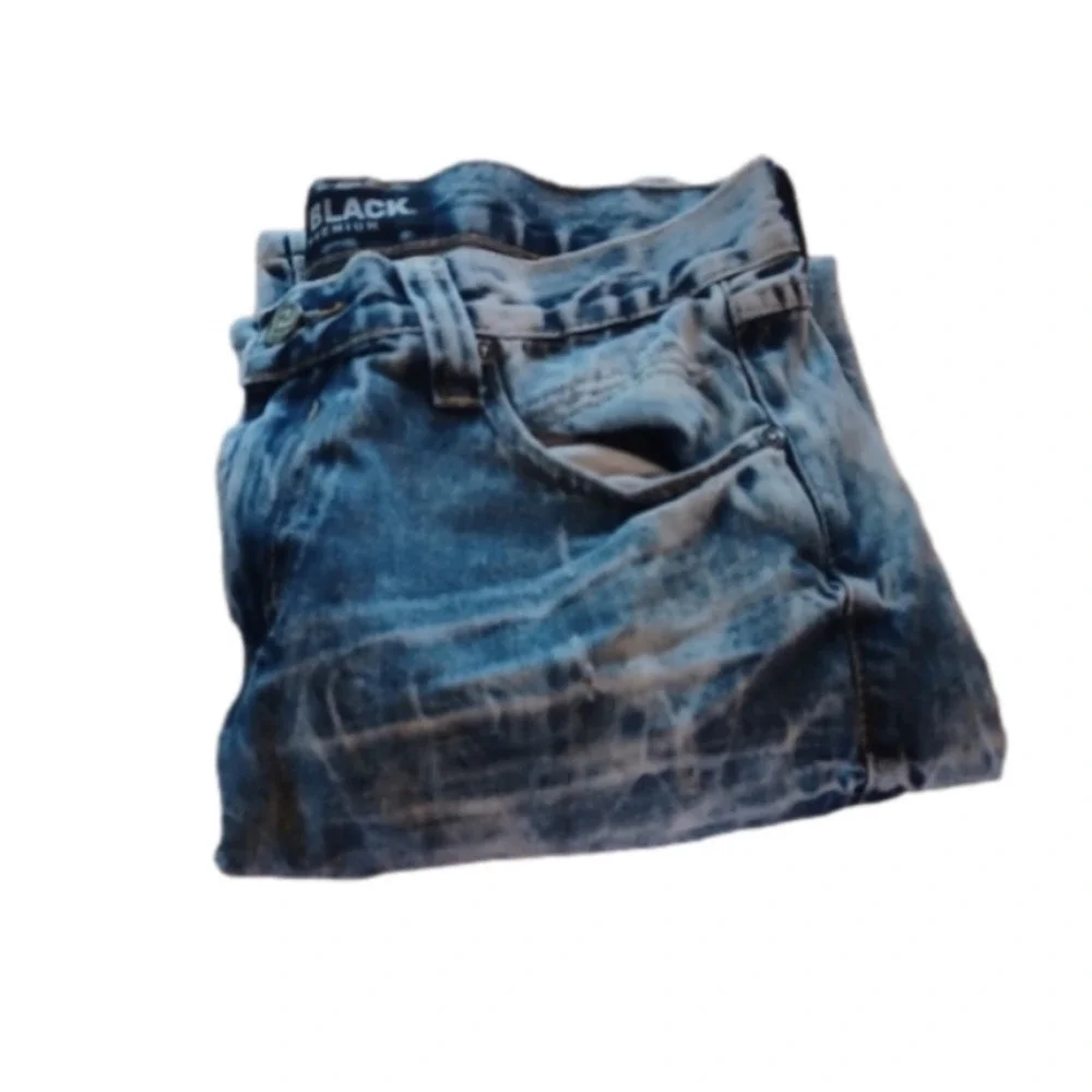 Black brand super distressed, acid wash looking jeans.Size 30x32.